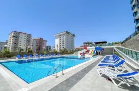 te koop Modern Gemeubileerd 1+1 Appartement in Mahmutlar Alanya