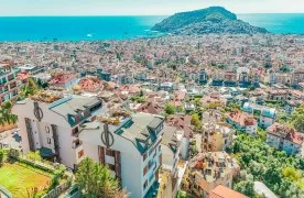 te koop 4+1 Tuin Duplex Appartement met Zee uitzichten in Alanya