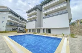 Gloednieuw 1+1 Appartement met Zwembad te koop in Alanya Oba